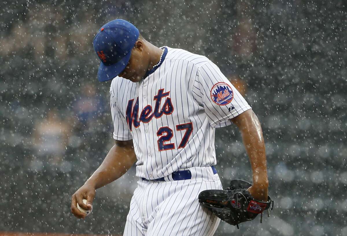 New York Mets relief pitcher Jeurys Familia (27) reacts on the mound after allowing a go-ahead, ninth-inning, three-run, home run to San Diego Padres' Justin Upton in a baseball game in New York, Thursday, July 30, 2015. (AP Photo/Kathy Willens)