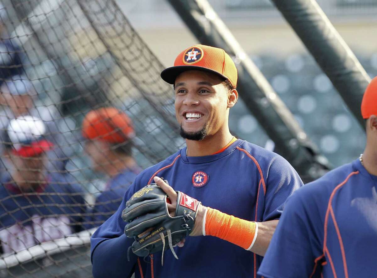 Houston Astros center fielder Carlos Gomez smiles before Friday’s game against the Minnesota Twins in Minneapolis.
