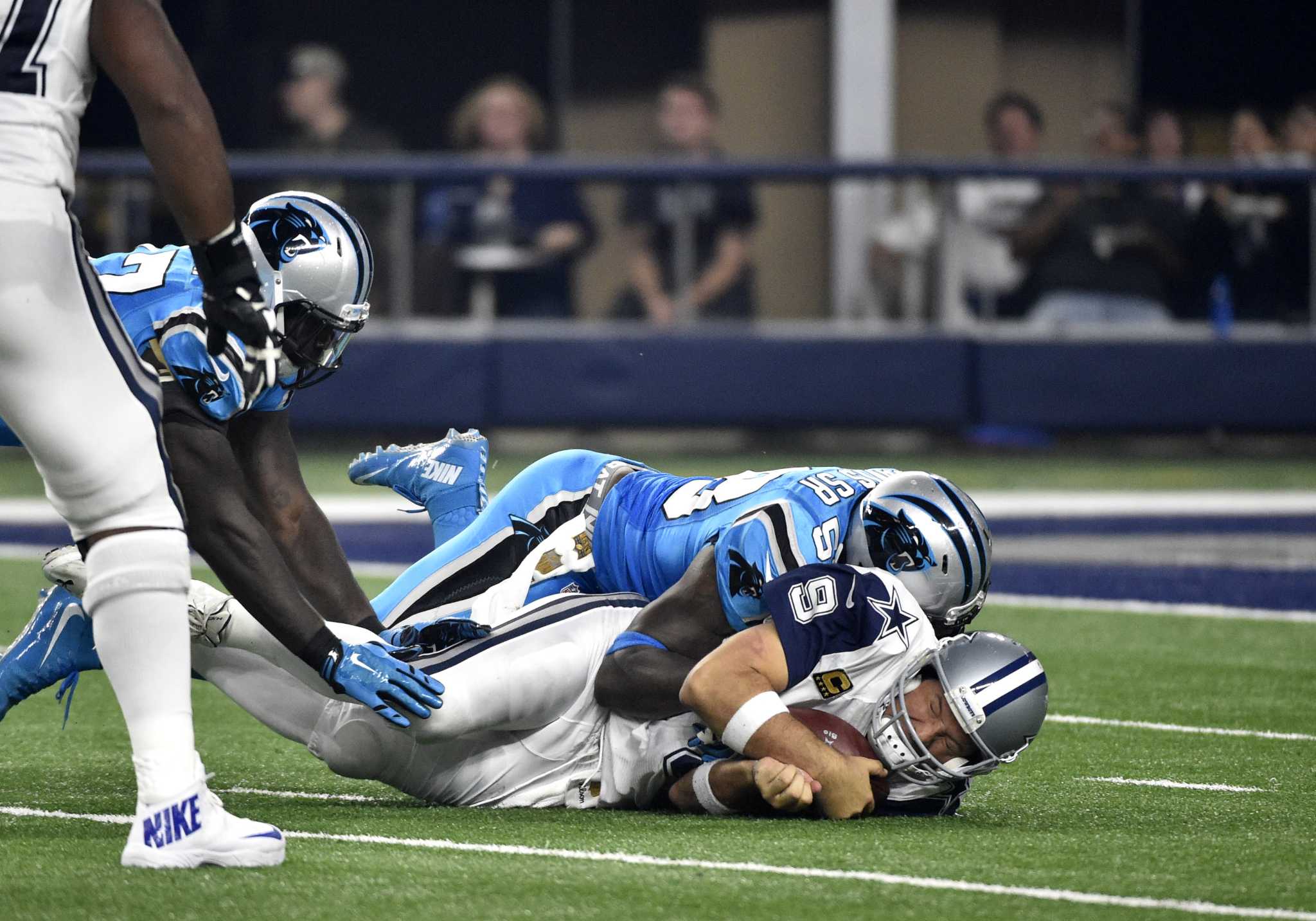 Romo hurt again in Panthers' dominant W over Dallas