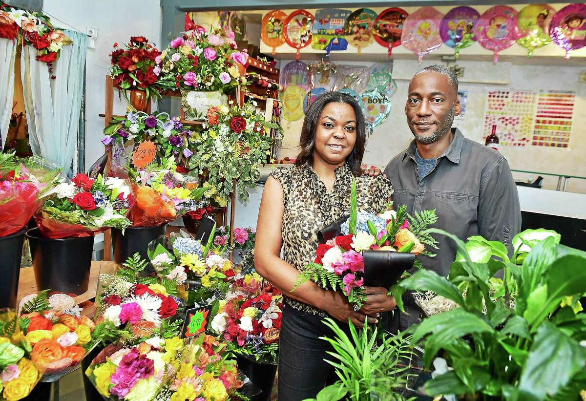 (Catherine Avalone - New Haven Register) New Haven residents Carrien and Chris Davis, owners of Any Occasion Creation, designs unique silk and fresh floral arrangements for all occassions, at 847 Whalley Avenue in New Haven. The Davis' moved just a block to their present location in December 2014, and continue to build their customer base. Visit their website at www.AnyOccasionCreation.biz or stop by Monday thru Saturday from 10 a.m. to 7 p.m.