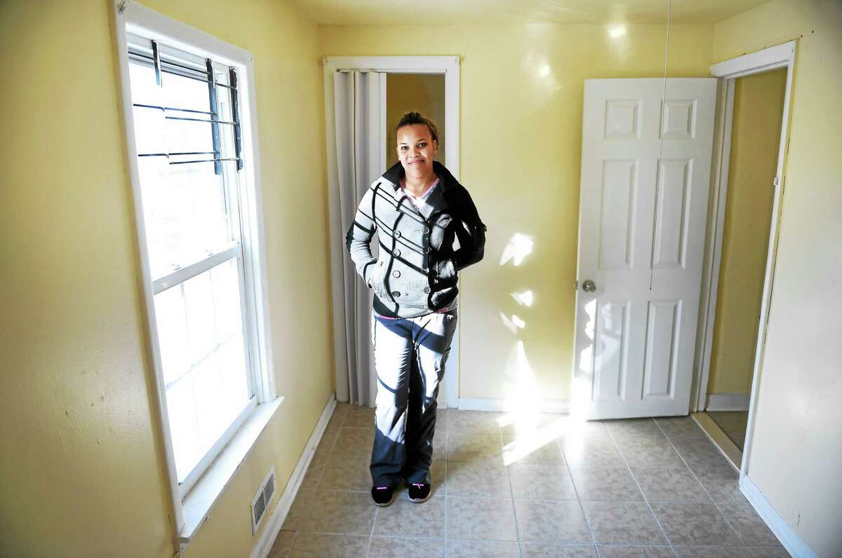 Yomaly Rivera is photographed in one of the bedrooms in her new home on Tyler Street in New Haven Monday.
