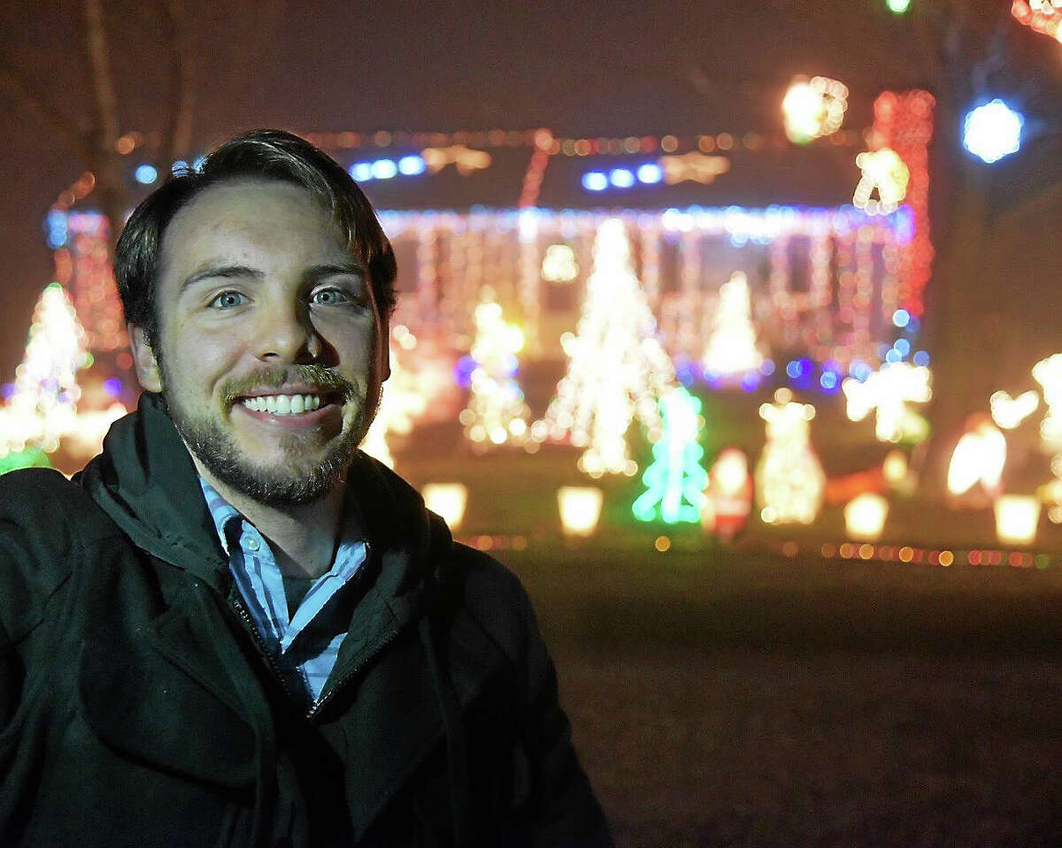 Joe Petrowski Jr. and his bright, colorful Christmas light show at the Petrowski house located at 163 Valley Shores Drive. The light show raises money for the Make-A-Wish-Foundation.