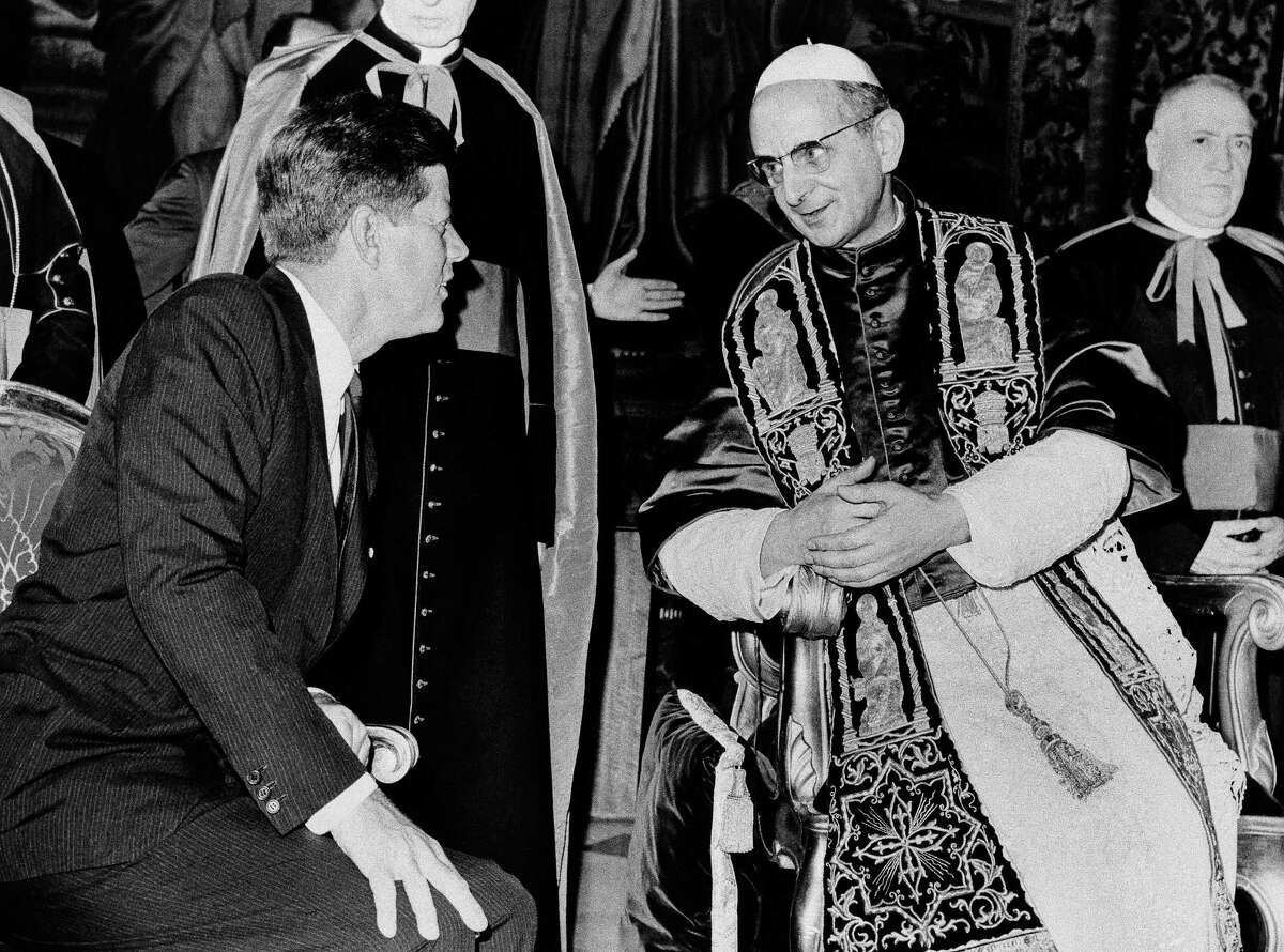 President John F. Kennedy and Pope Paul VI talk at the Vatican in this July 2, 1963, file photo. Kennedy’s meeting with Pope Paul VI at the Vatican was historic: the first Roman Catholic president of the United States was seeing the Roman Catholic pontiff only days after his coronation. Kennedy _ who struggled against anti-Catholic bias during his presidential campaign _ only shook hands with the pope rather than kissing his ring, as is the usual practice for Catholics.