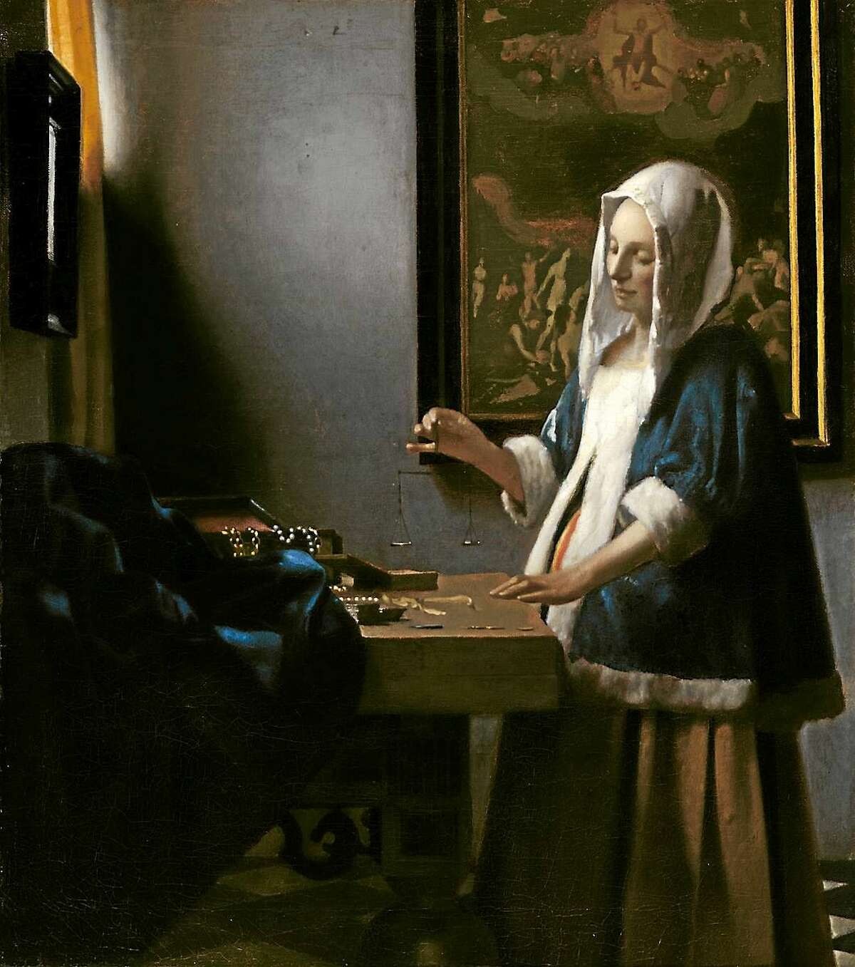 Johannes Vermeer (Dutch, 1632-1675 ), “Woman Holding a Balance,” c. 1664, oil on canvas.
