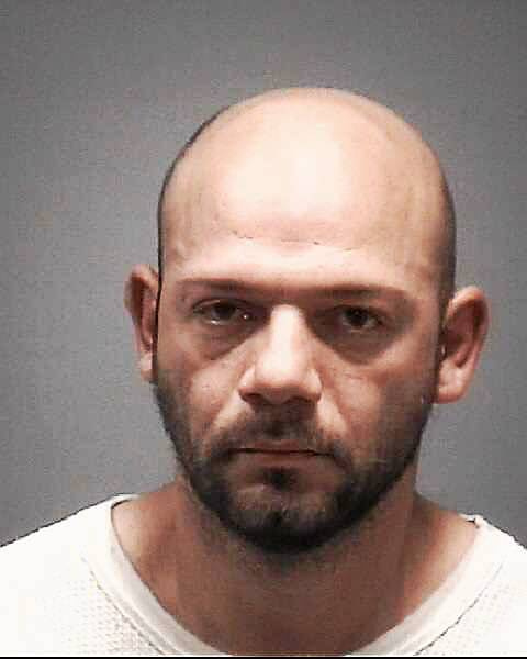New Haven man charged with home invasion, 2 suspects remain at large