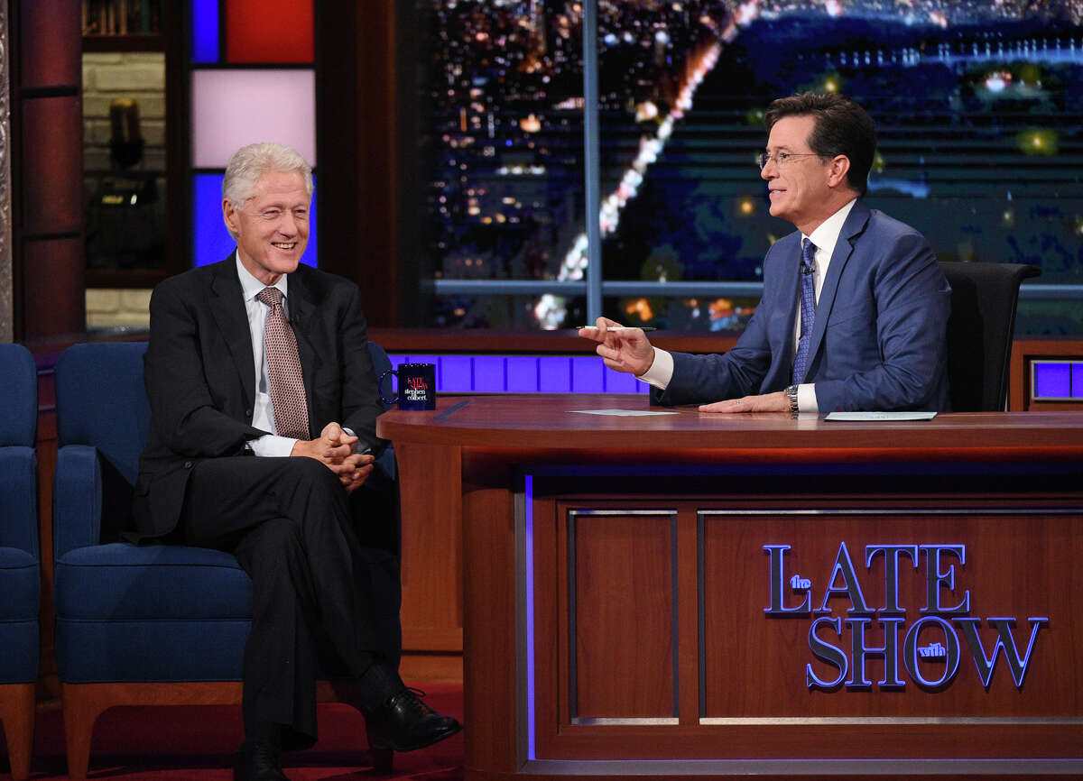 In this image released by CBS, former President Bill Clinton, left, appears with host Stephen Colbert during a taping of “The Late Show with Stephen Colbert,” airing Oct. 6, 2015 in New York.