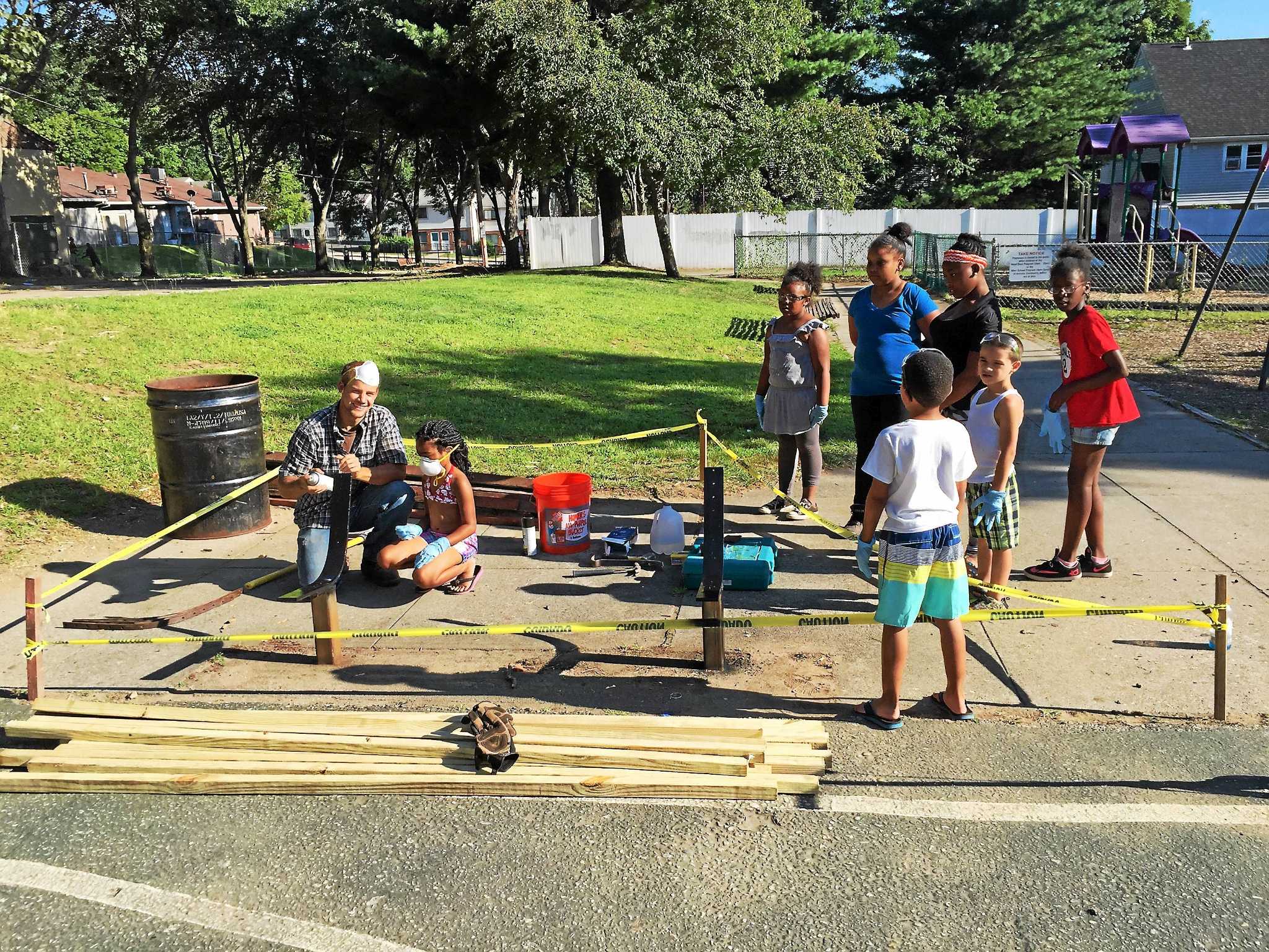 Volunteers give Ansonia park a facelift