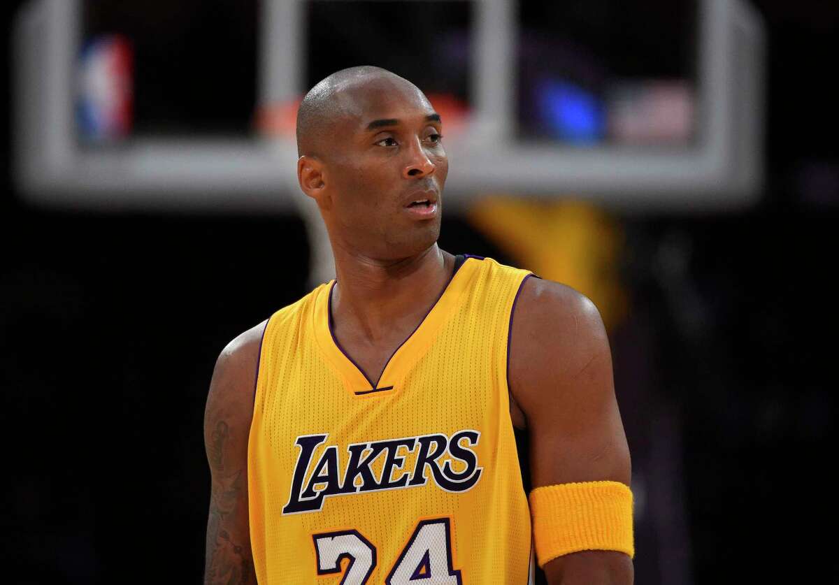 Lakers forward Kobe Bryant looks on during the first half of a recent game against the Denver Nuggets.