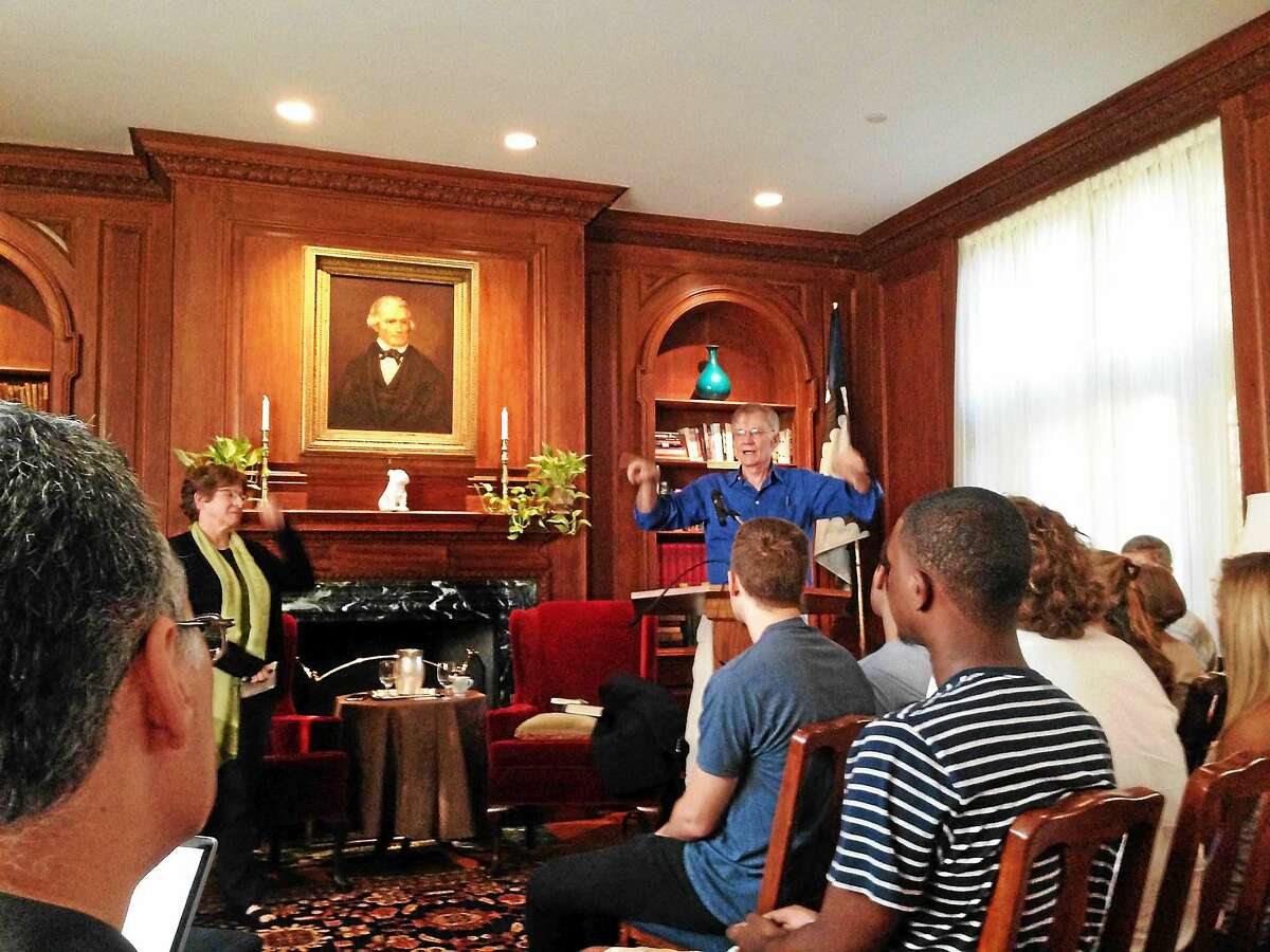 History professor David Blight, rear right, speaks about John C. Calhoun Wednesday at Yale University’s Calhoun College. Calhoun Master Julia Adams is at rear left.