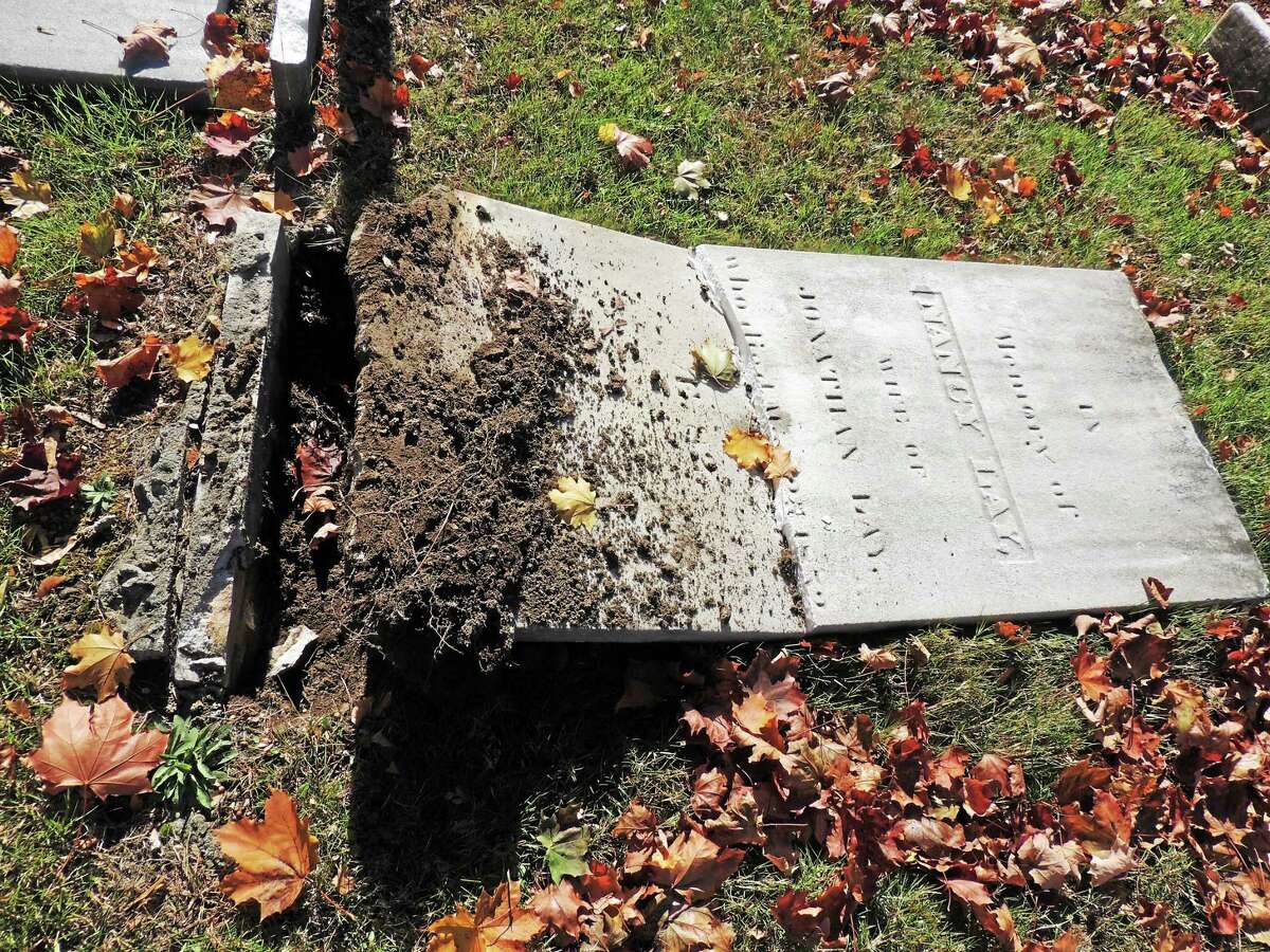 Dozens of headstones were knocked over, damaged and moved this past weekend at the Old Burying Ground Cemetery on Old Clinton Road in Westbrook. Among them was the headstone of prominent early resident Nancy Lay, who died in May 1852 at 82.
