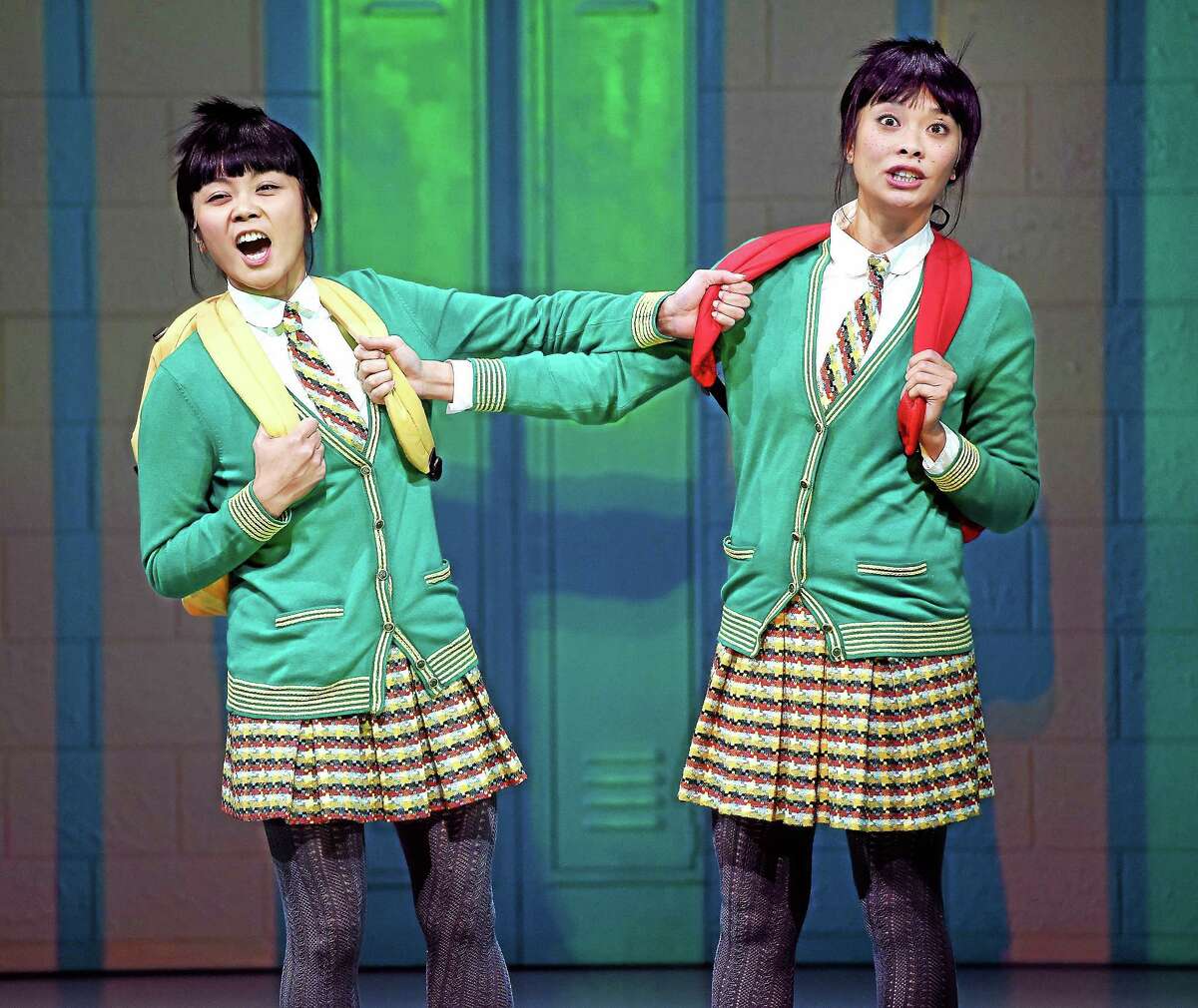 Teresa Avia Lim, left, and Tiffany Villarin as twin sisters rehearse a scene from “peerless” at the Yale Repertory Theatre in New Haven.
