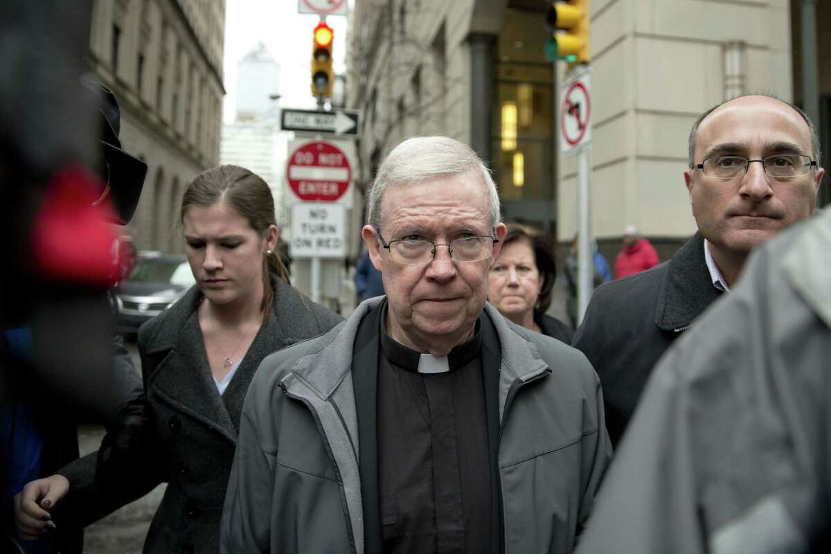 In this Jan. 6, 2014 file photo, Monsignor William Lynn walks from the criminal justice center after a bail hearing in Philadelphia. Lynn, a former church official jailed for his handling of priest sexual-abuse complaints, is housed in a Philadelphia prison that Pope Francis plans to visit during his U.S. trip. (AP Photo/Matt Rourke)