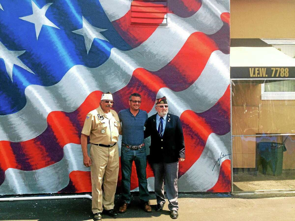 In Milford, artist paints larger than life flag to honor America, veterans