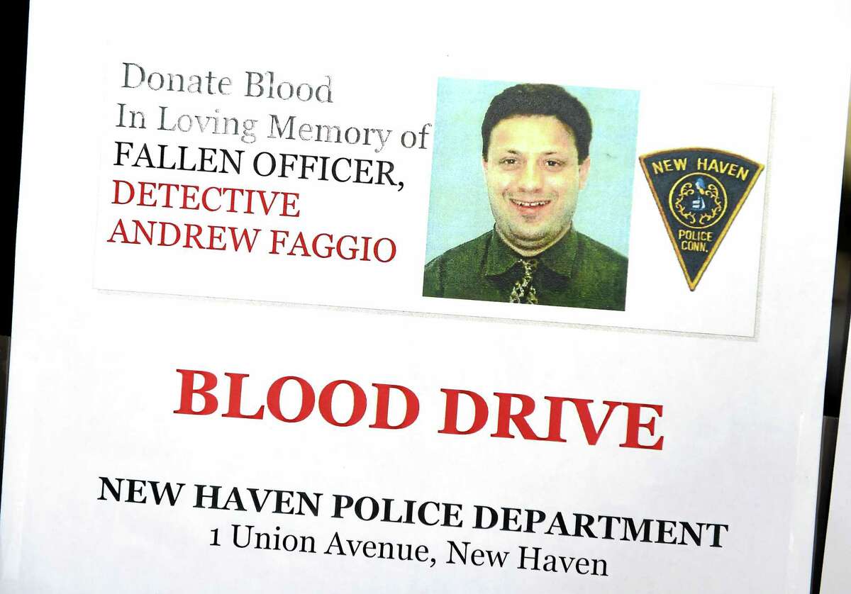A sign at the New Haven Police Department advertises a blood drive in memory of late Detective Andrew Faggio.