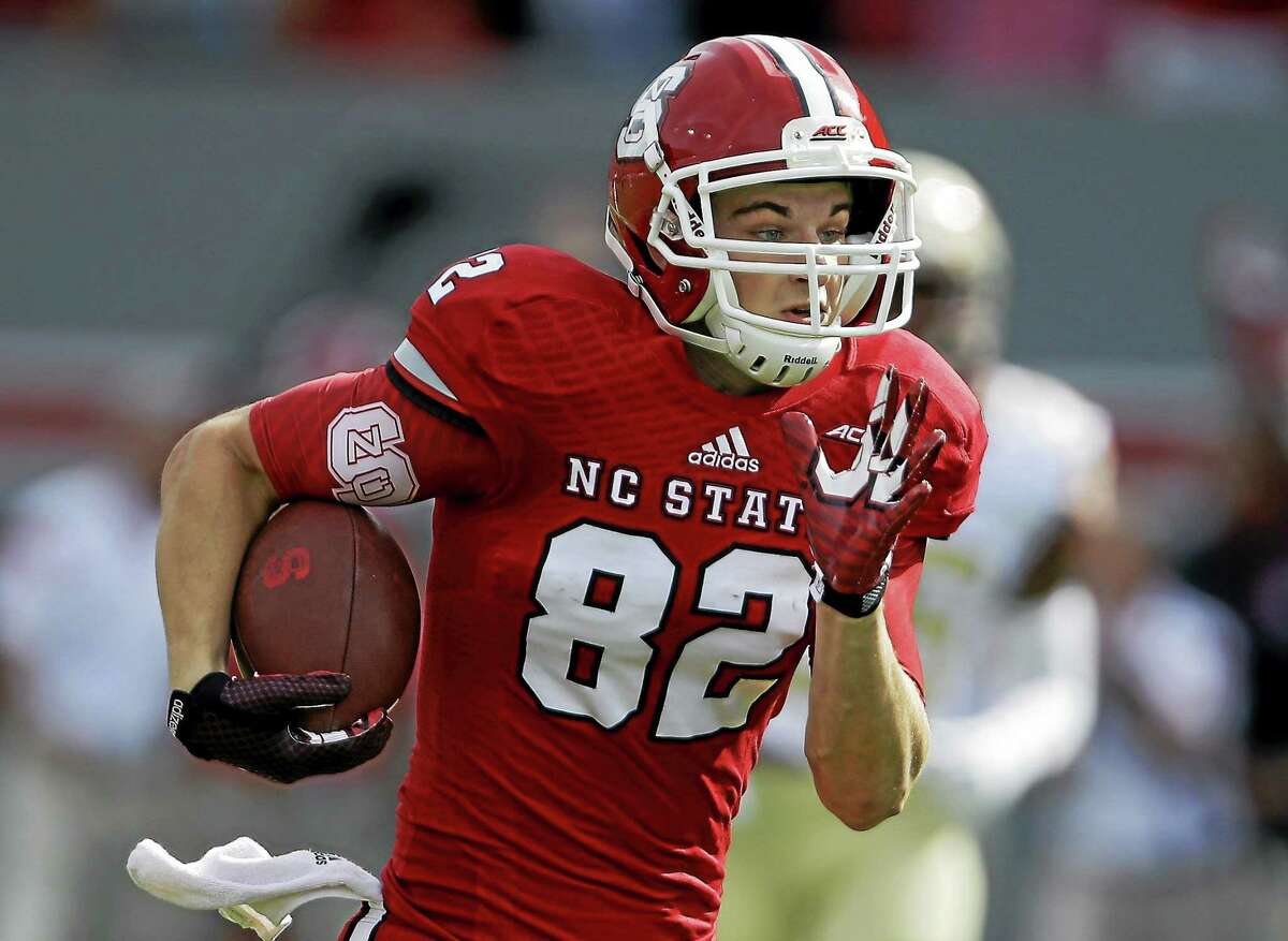 Bo Hines runs for a touchdown against Florida State during a Sept. 27, 2014 game in Raleigh, N.C.