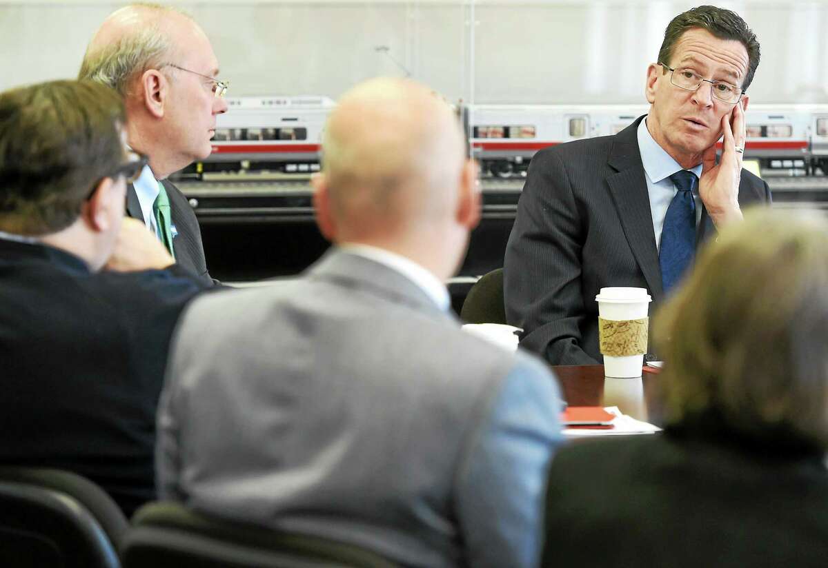 Governor Dannel P. Malloy hosts a meeting with business leaders and state and local officials at Union Station in New Haven Thursday.