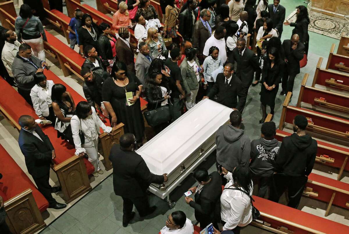 Pallbearers guide a casket containing the body of Freddie Gray out of New Shiloh Baptist Church after his funeral Monday in Baltimore.