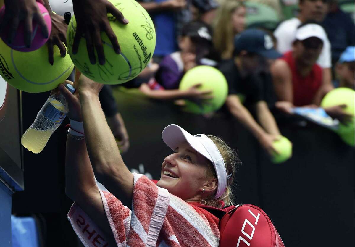 Ekaterina Makarova signs autographs for fans after defeating Simona Halep in their quarterfinal match at the Australian Open on Tuesday in Melbourne.