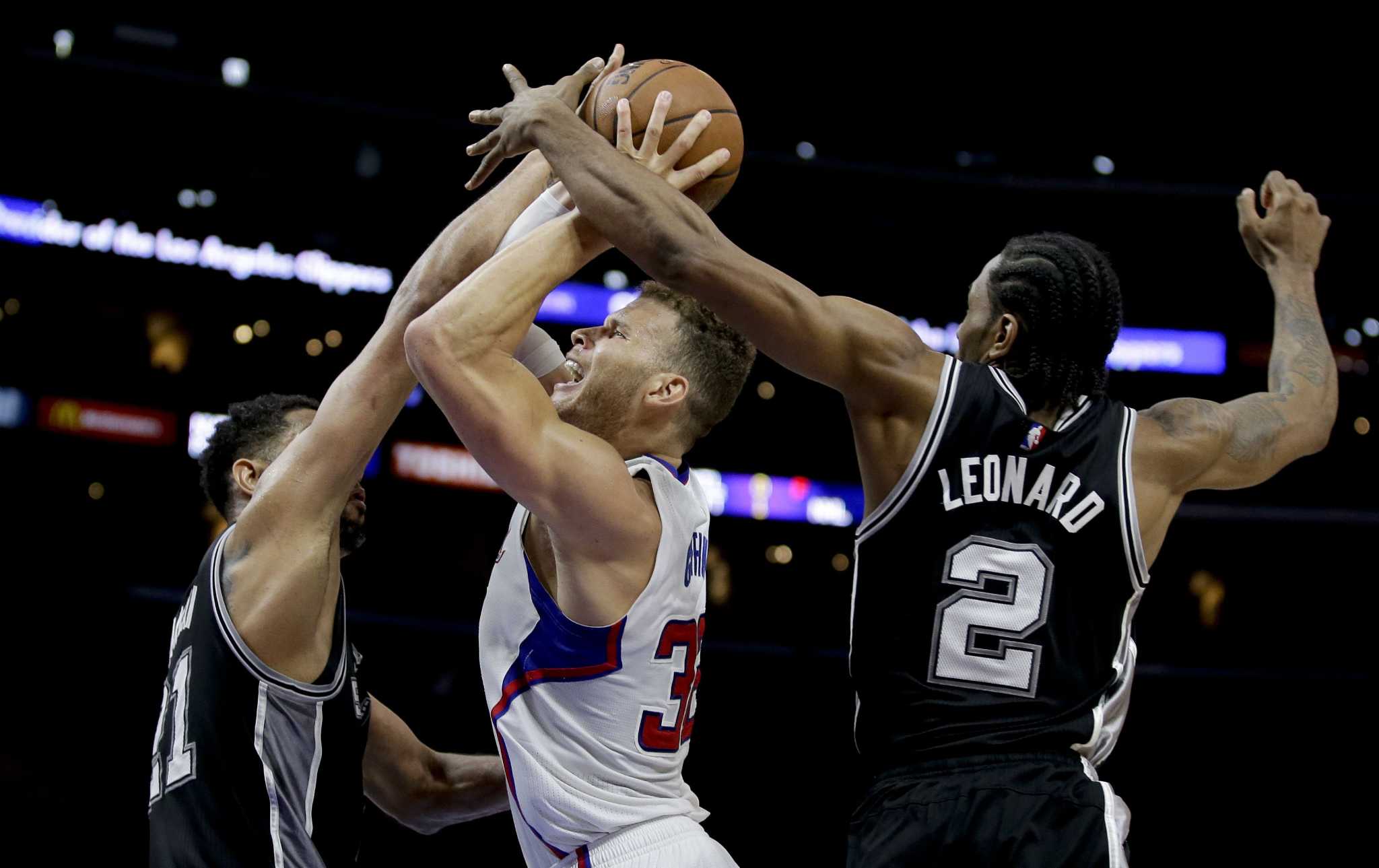 Spurs' Kawhi Leonard wins second straight NBA defensive player of year  award - Los Angeles Times