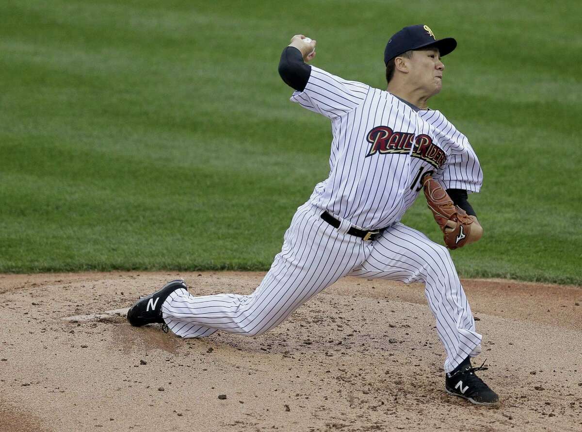 New York Yankees pitcher Masahiro Tanaka, playing for the Triple A Scranton/Wilkes-Barre RailRiders, delivers against the Durham Bulls on Thursday in Scranton, Pa.