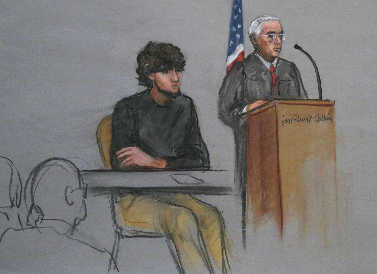 FILE - In this Jan. 5, 2015, file courtroom sketch, Boston Marathon bombing suspect Dzhokhar Tsarnaev, left, is depicted beside U.S. District Judge George O'Toole Jr., right, as O'Toole addresses a pool of potential jurors in a jury assembly room at the federal courthouse, in Boston. Lawyers for Boston Marathon bombing suspect Tsarnaev have asked a judge three times to move his trial out of Massachusetts because of the emotional impact of the deadly attack. Three times, the judge has refused. On Thursday, Feb. 19, Tsarnaevís defense team will ask a federal appeals court to take the decision out of the hands of OíToole Jr. and order him to move the trial. They insist that Tsarnaev cannot find a fair and impartial jury in Massachusetts because too many people believe heís guilty and many have personal connections to the marathon or the bombings. (AP Photo/Jane Flavell Collins, File)