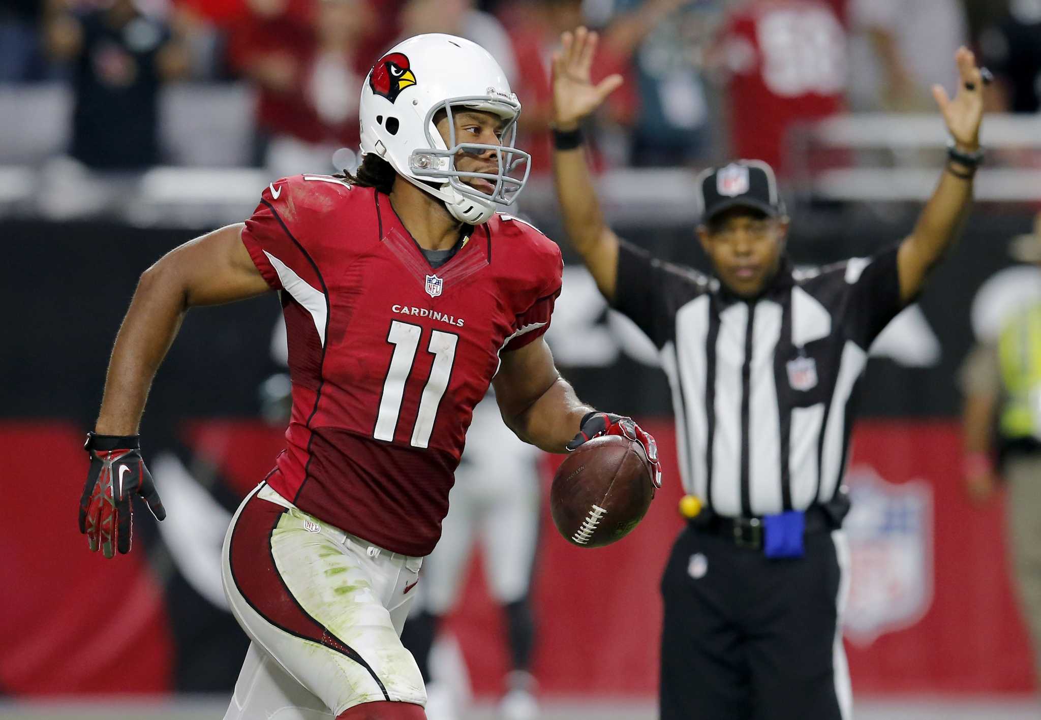 Larry Fitzgerald stays with Arizona under 2-year deal.
