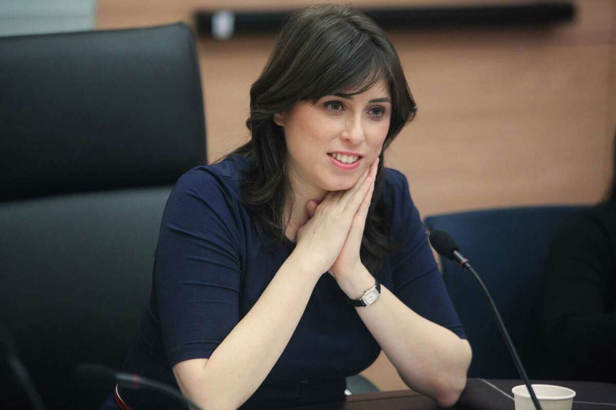 In this photo taken March 13, 2012, Knesset member Tzipi Hotovely sits in the Knesset, Israel's parliament, in Jerusalem. on Thursday, May 21, 2015 Hotovely, Israelís new deputy foreign minister, delivered a defiant message to the international community on Thursday, May 21, 2015, saying that Israel owes no apologies for its policies in the Holy Land and citing religious texts that it belongs to the Jewish people. (AP Photo/Emil Salman)