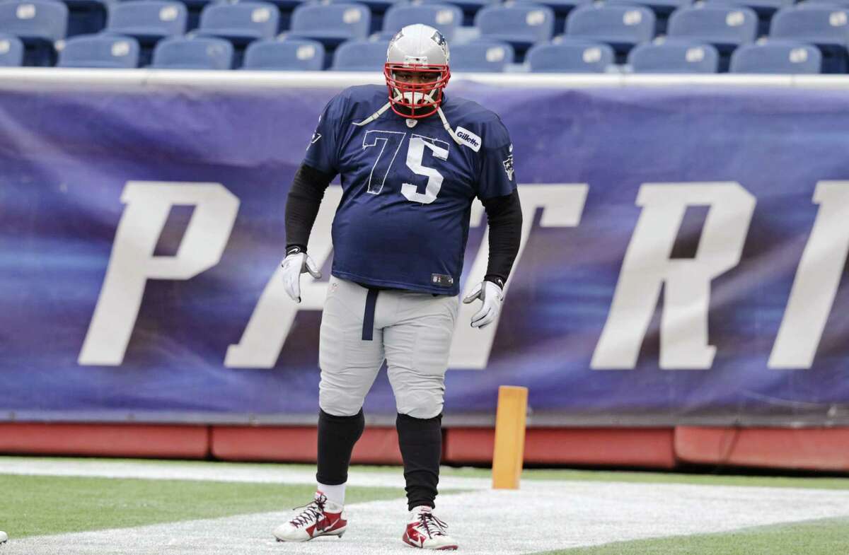 New England Patriots defensive lineman Vince Wilfork stands in the end zone during practice on Wednesday at Gillette Stadium in Foxborough, Mass.