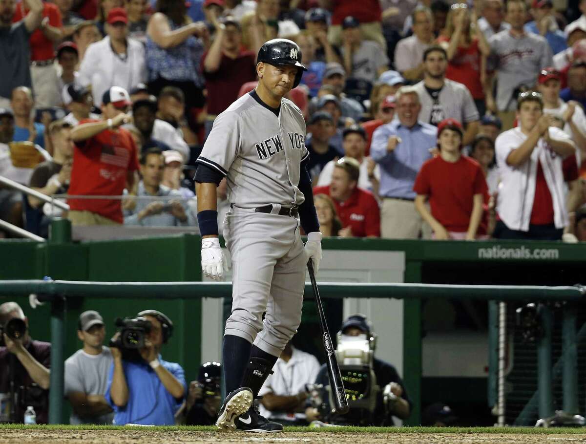 The New York Yankees’ Alex Rodriguez reacts after striking out in the ninth inning of Tuesday night’s game against the Nationals in Washington.