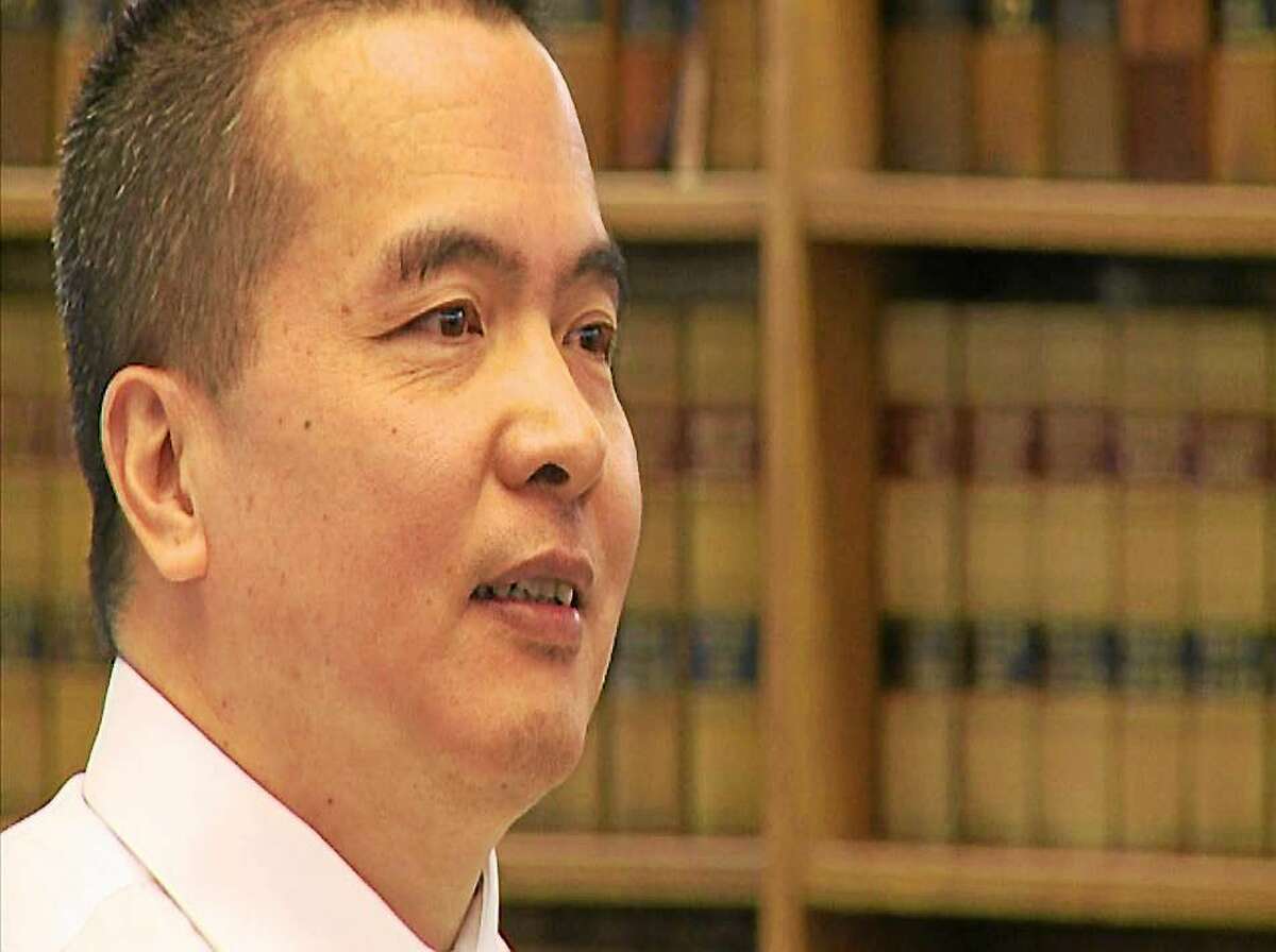 Dr. Lishan Wang during a pre-trial hearing at Superior Court in New Haven