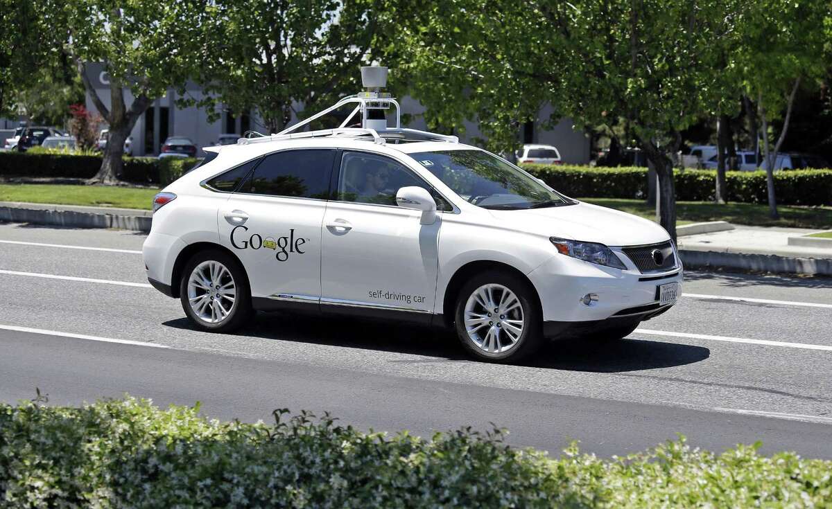 This May 13, 2014, file photo shows a Google self-driving Lexus at a Google event outside the Computer History Museum in Mountain View, Calif. Of the nearly 50 self-driving cars rolling around California roads and highways, four have gotten into accidents since September 2014.