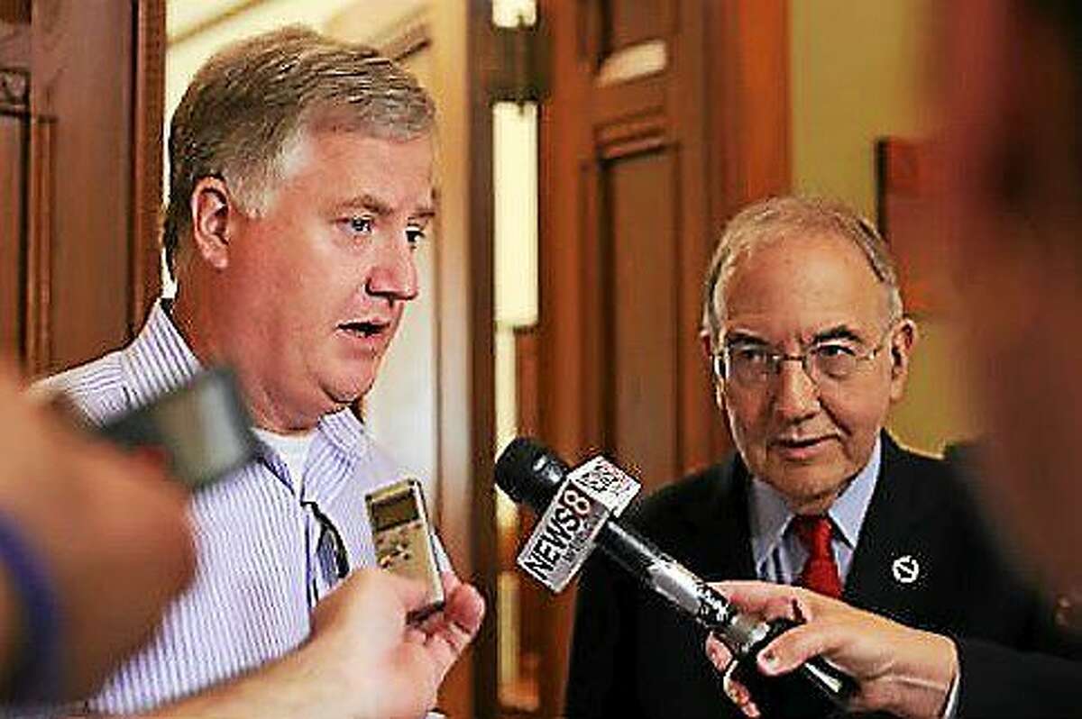 House Speaker Brendan Sharkey and Senate President Martin Looney leave Gov. Malloy’s office