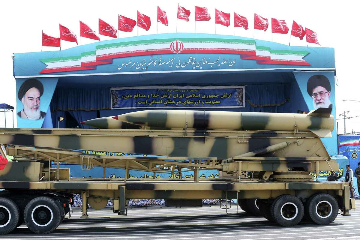 Missiles are displayed by the Iranian army in a military parade marking National Army Day in front of the mausoleum of the late revolutionary founder Ayatollah Khomeini, just outside Tehran, Iran, Saturday, April 18, 2015. Iranian President Hassan Rouhani harshly criticized Saudi Arabia Saturday, warning that the Saudi royal family in Riyadh will harvest the hatred it is sowing in Yemen through its airstrike campaign. (AP Photo/Ebrahim Noroozi)