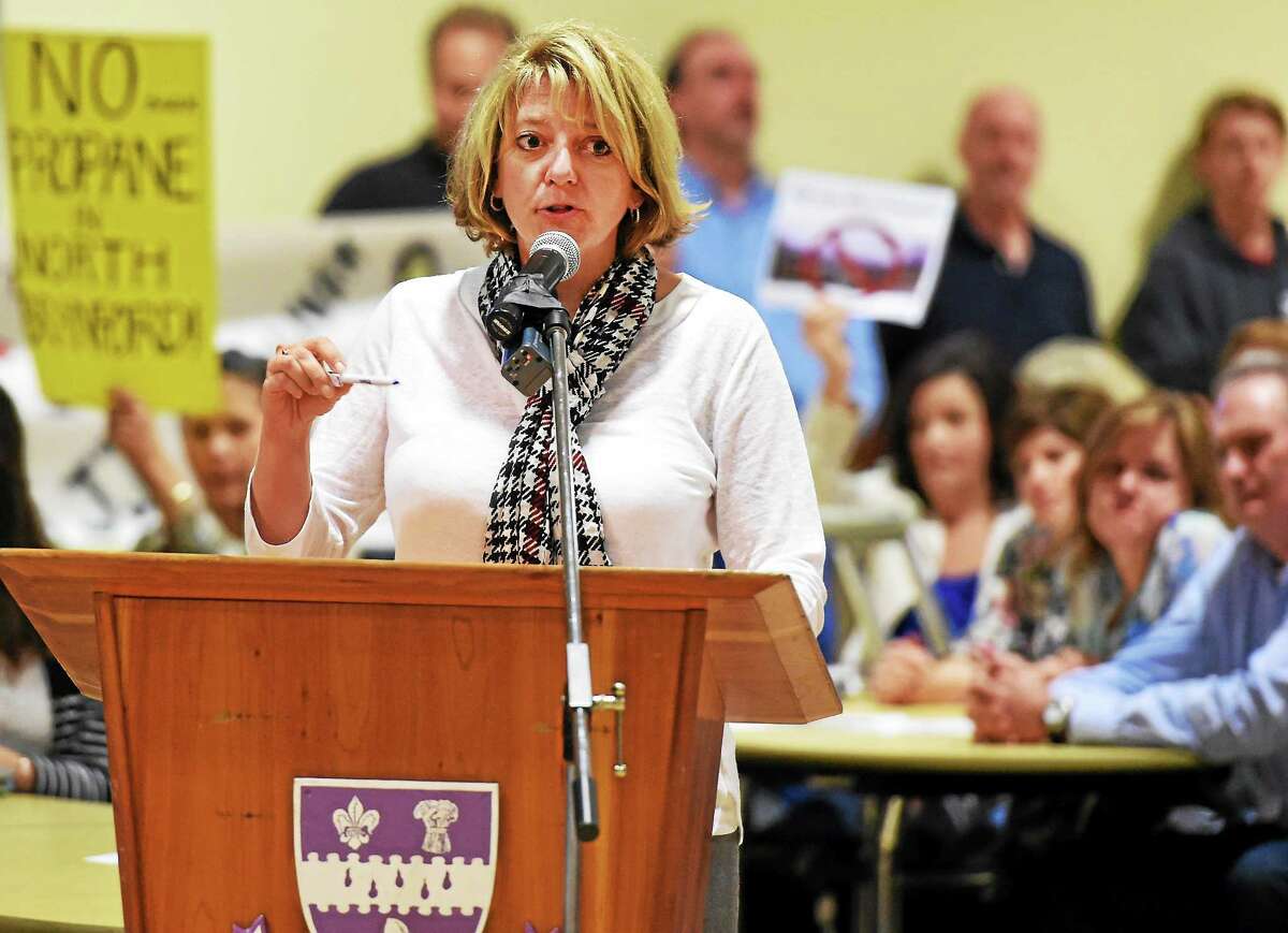 Kristen L. Butler, Executive Director of Evergreen Woods retirement community in North Branford, representing residents at Evergreen Woods, opposes the development of the proposed J.J. Sullivan bulk propane storage tanks in North Branford during a Town Council meeting at the North Branford Intermediate School Tuesday evening, October 7, 2014.
