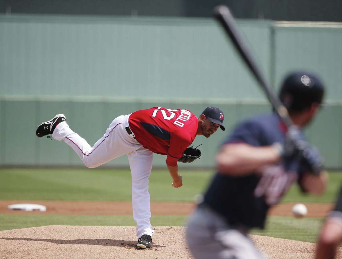 Boston Red Sox starter Rick Porcello delivers against the Minnesota Twins during the first inning of a spring training game on Wednesday in Fort Myers, Fla.