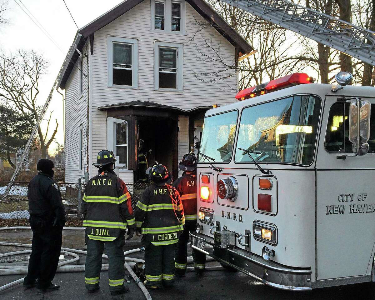 Firefighters battled a fire on the first floor of a vacant home at 131 West St. in New Haven early Wednesday. No one was inside the home and the cause of the fire remained under investigation.