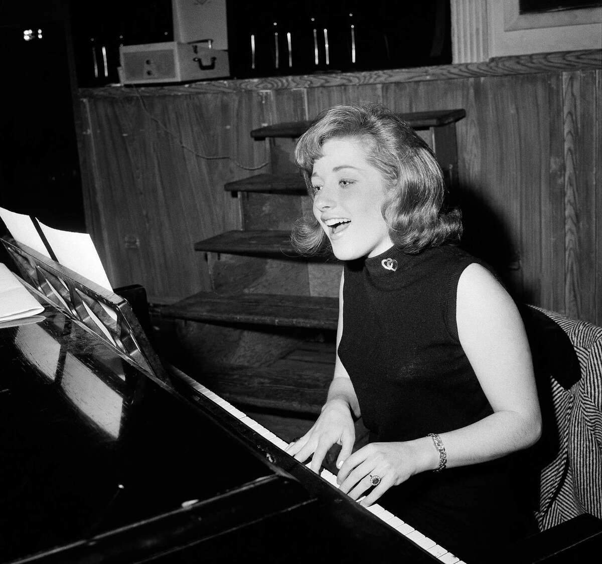 In this Jan. 5, 1966 file photo, singer Lesley Gore rehearses at a piano, in New York.