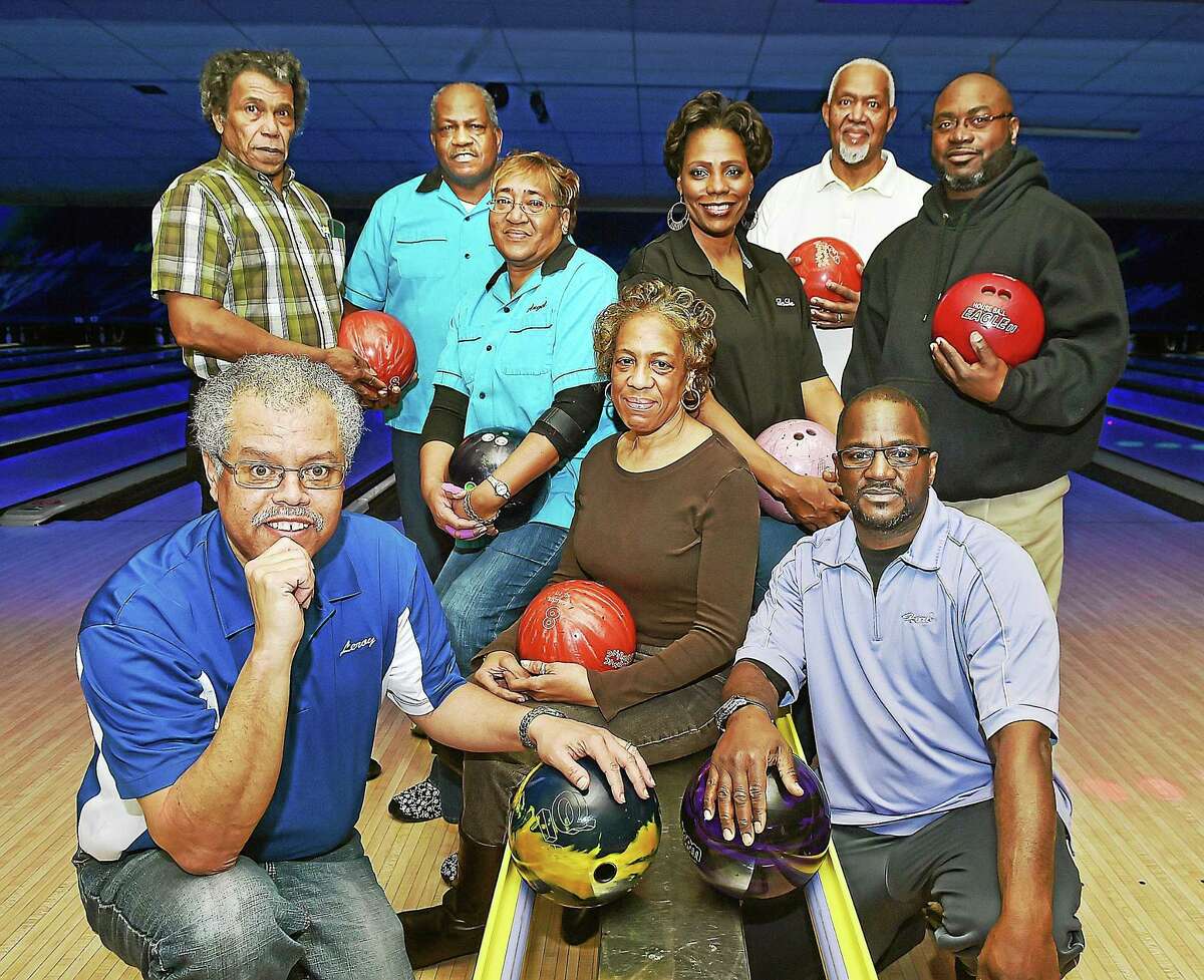 Men in back row, from left, Barry Diggs, Barbara Fox Classic Bowling League 35-year founding member; Mack Jones, 35-year founding member and The National Bowling Association Elm City Senate president; Ed Hines, The National Bowling Association Elm City Senate vice president; Sean Leak, Barbara Fox Sargeant at Arms. Women in center, clockwise from left: Angel Diggs, Barbara Fox 35-year founding member; Loretta Bellamy, Barbara Fox league president; and Sheryl Ravenell, The National Bowling Association E;m City Senate secretary/treasurer. Men in front: Leroy Owens Jr., left, Barbara Fox league secretary/treasurer; and Herb Barrett, Barbara Fox league vice president.