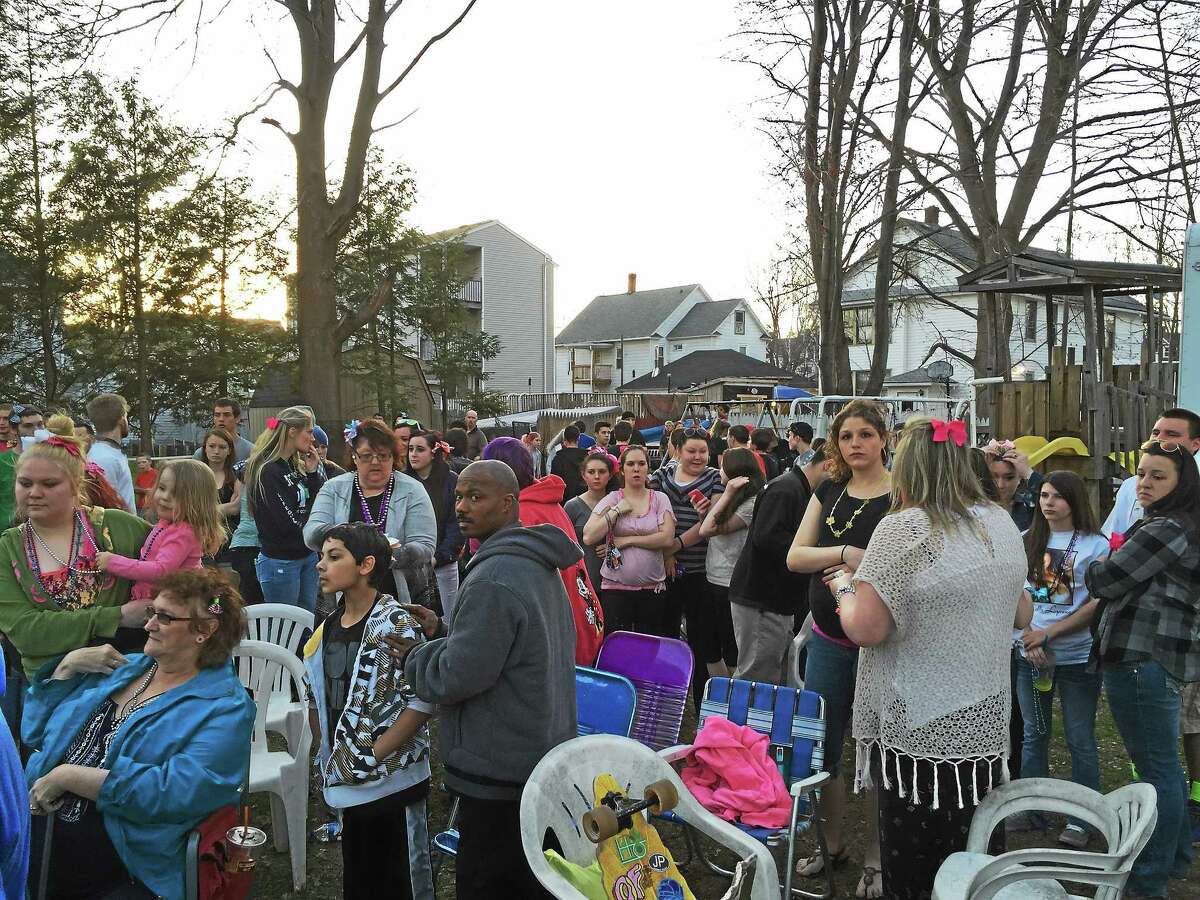 Several hundred gathered in the backyard of the home where Holly lived on Saturday evening. Friends, family and supporters from all over came to show support for the family.