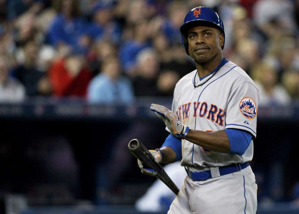 The Mets’ Curtis Granderson reacts after striking out against the Toronto Blue Jays.