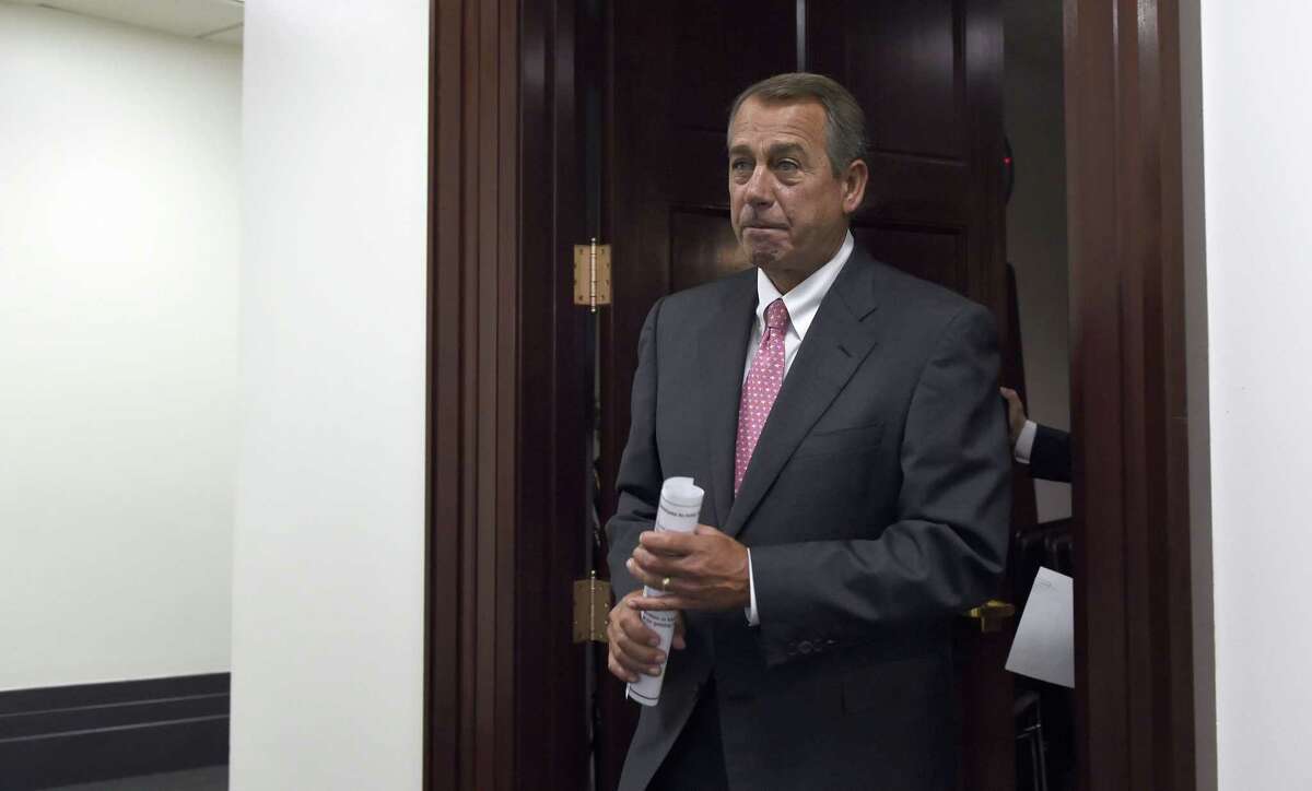 House Speaker John Boehner of Ohio arrives for a news conference on Capitol Hill in Washington. The House debates and votes for final passage on NSA Surveillance legislation, known as the USA Freedom Act.