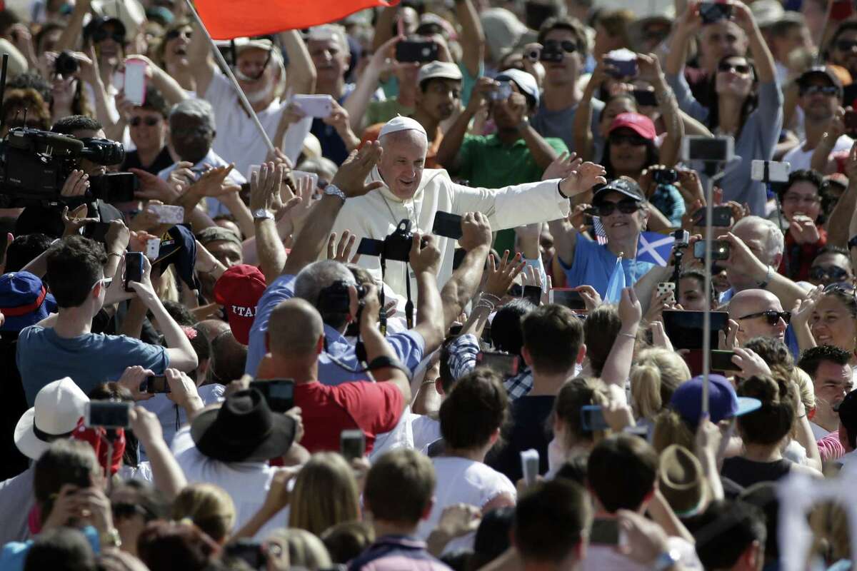 Pope Francis arrives to celebrate his weekly general audience, in St. Peter's Square at the Vatican, Wednesday, June 17, 2015. (AP Photo/Andrew Medichini)