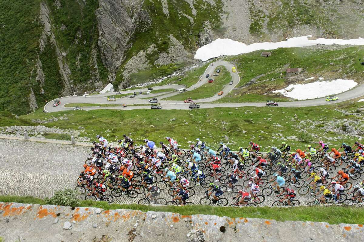 The pack rides the old “Tremola” road, a cobblestone section, as the riders climb the Gotthard Pass during the 3rd stage, a 117.3 km race, from Quinto to Olivone, at the 79th Tour de Suisse UCI ProTour cycling race, in the Gotthard Pass, Switzerland on June 15, 2015.