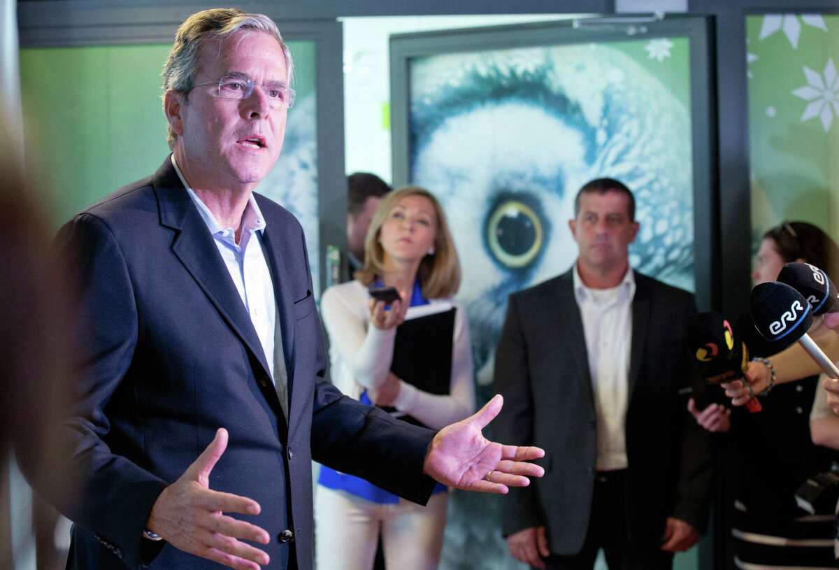 Former US Governor of Florida Jeb Bush speaks to journalists at the e- Estonia Showroom during his visit in Tallinn, Estonia, Saturday, June 13, 2015. Bush visits Estonia, a once-bleak Soviet state that now has a growing, free-market economy. If he was trying to stoke memories of his father and his legacy as president, Bush appears to have largely succeeded. (AP Photo/Liis Treimann)