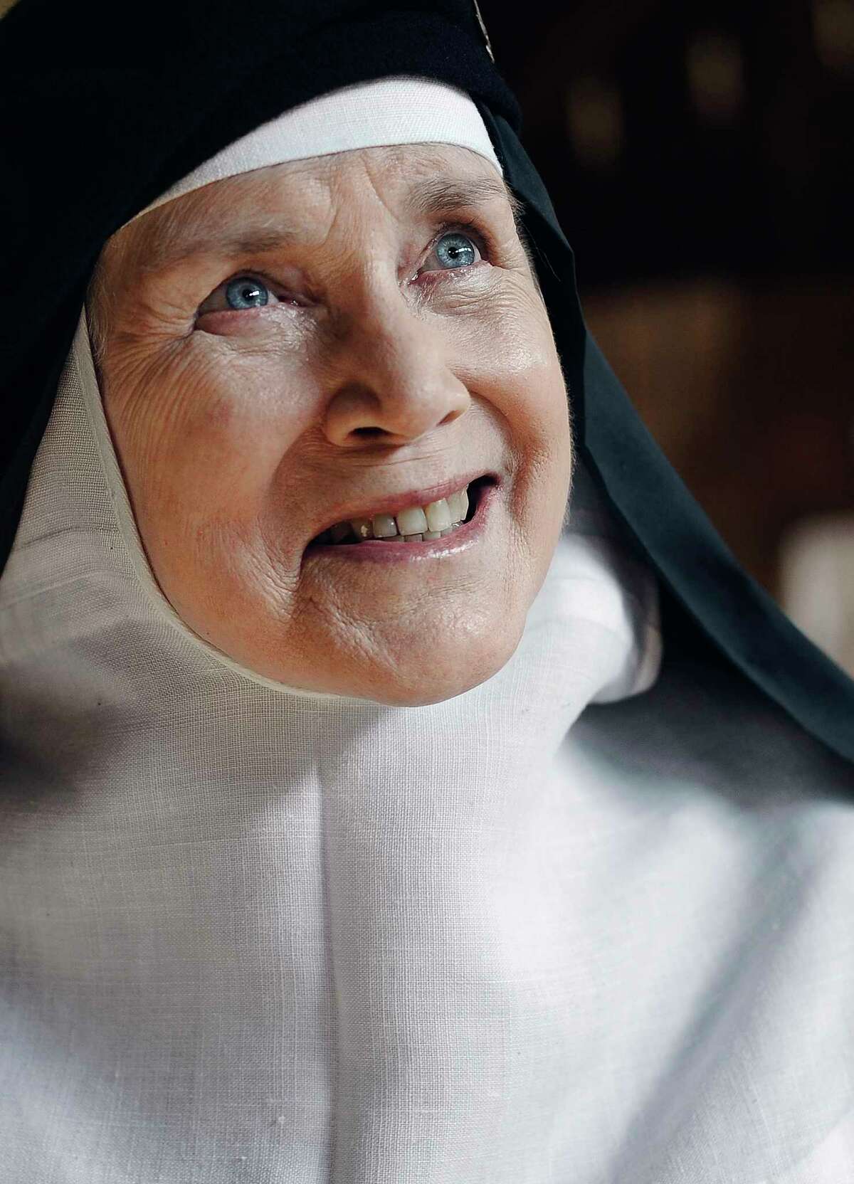 In this Friday, May 15, 2015 photo, Mother Dolores Hart poses for a photograph at the Abbey of Regina Laudis, in Bethlehem, Conn. Mother Dolores, a former actress who is best known for sharing the first on-screen kiss with Elvis Presley, has helped the Abbey which is in need of renovations gain exposure and aid from fans of Presley. (AP Photo/Jessica Hill)