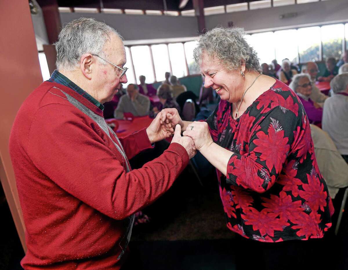 (Arnold Gold-New Haven Register) Roger and Alma Loiseau dance to the music of The Clamdiggers at the 25th Annual Valentine's Day party for West Haven couples married at least 50 years at the Savin Rock Conference Center in West Haven on 2/13/2015. The Loiseaus have been married for 52 years.