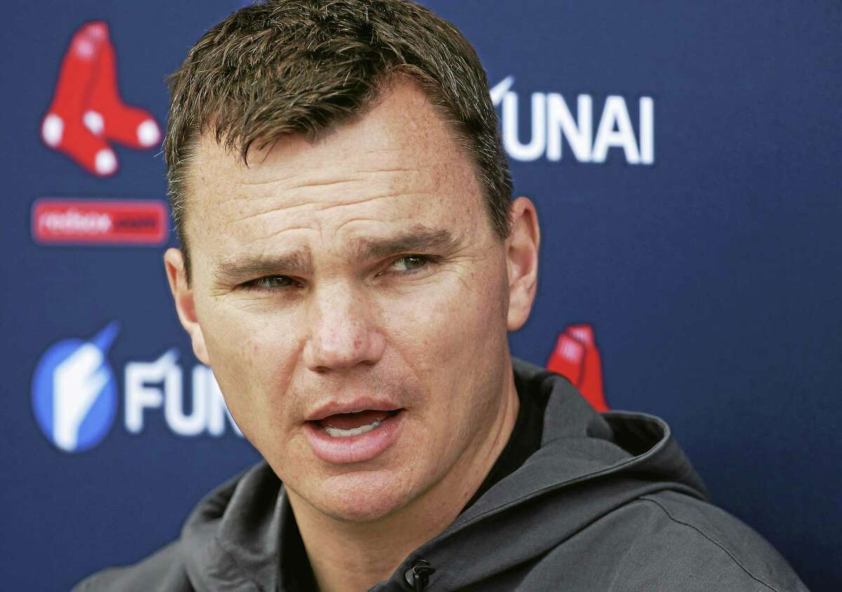 Boston Red Sox general manager Ben Cherington speaks with reporters during spring training last season.