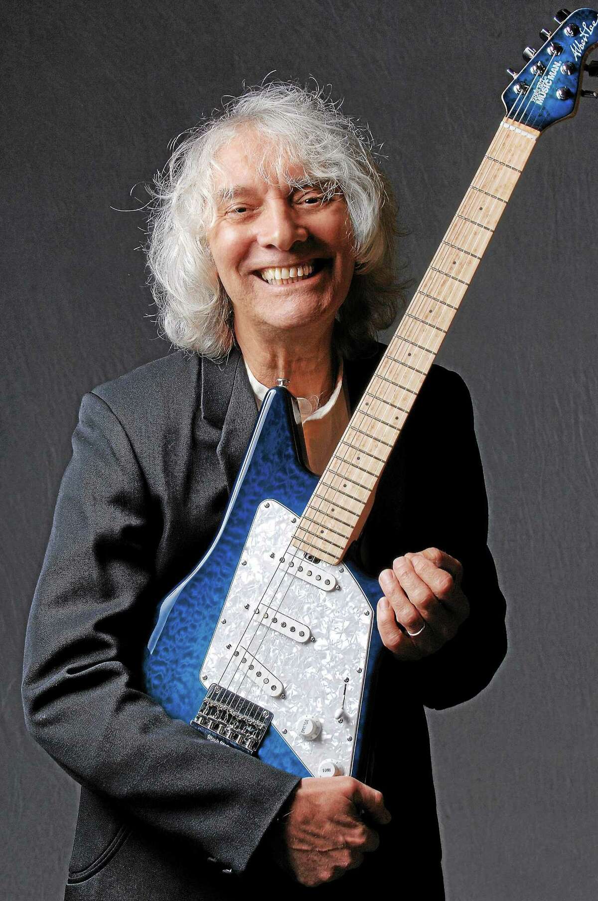 Guitar players will be coming to hear Albert Lee on guitar