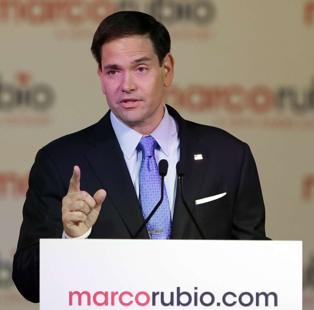 Florida Sen. Marco Rubio gestures as he announces that he is running for the Republican presidential nomination during a rally at the Freedom Tower, Monday, April 13, 2015, in Miami.