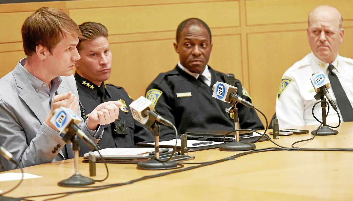 Ken Barone, Policy and Research Specialist with IMRP at Central Connecticut State University, far left, speaks during the AAAC Connecticut Racial Profiling Prohibition Project Forum discussion at New Haven City Hall Aldermanic Chamber Monday evening, April 13, 2015. With Barone are, left to right, Hamden Police Chief Thomas Wydra, New Haven Police Assistant Chief Anthony Campell and New Haven Police Chief Dean Esserman.